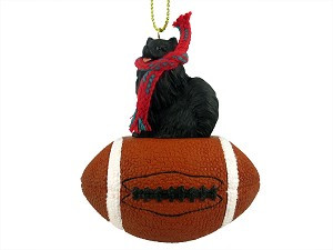 Black Pomeranian Dog on Football Christmas Ornament – Hand-Painted Stone Resin