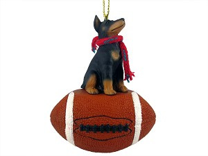 Black with Cropped Ears Doberman Pinscher Dog on Football Christmas Ornament