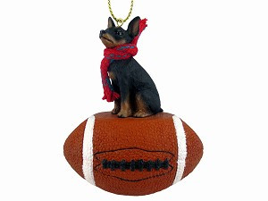 Tan & Black Miniature Pinscher Dog on Football Christmas Ornament – Hand-Painted Stone Resin