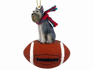 Gray Giant Schnauzer Dog on Football Christmas Ornament – Hand-Painted Stone Resin