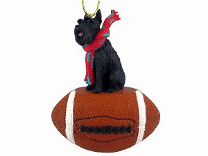 Black Giant Schnauzer Dog on Football Christmas Ornament – Hand-Painted Stone Resin