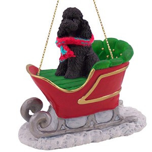 Black Sport Cut Poodle Dog in Sleigh Christmas Ornament