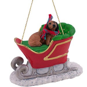 Longhaired Red Dachshund Dog in Sleigh Christmas Ornament