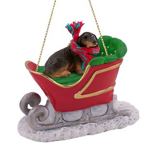 Longhaired Black Dachshund Dog in Sleigh Christmas Ornament