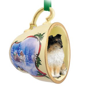 Tricolor Sheltie Dog in Sleigh Ride Tea Cup Christmas Ornament – Hand-Painted Stone Resin