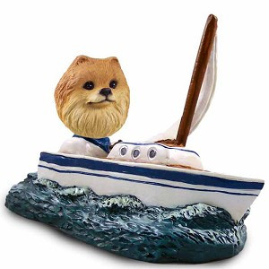 Red Pomeranian Sailboat Doogie Collectible Dog Figurine