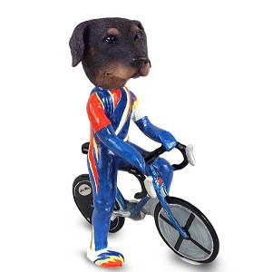 Black Doberman Pinscher Uncropped Ears Bicycle Doogie Collectible Dog Figurine