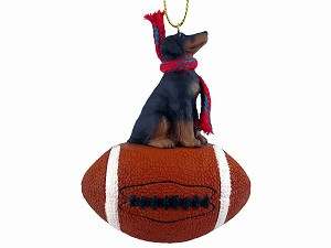 Black with Uncropped Ears Doberman Pinscher Dog on Football Christmas Ornament