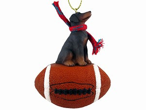 Red with Uncropped Ears Doberman Pinscher Dog on Football Hanging Ornament