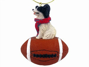 Black & White Papillon Dog on Football Christmas Ornament – Hand-Painted Stone Resin