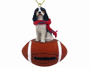 Black & White Cavalier King Charles Spaniel Dog on Football Christmas Ornament