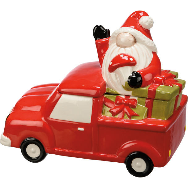 Ceramic Treat Cookie Jar - Waving Santa Gnome In Red Truck With Presents - 7.5 Inch - Christmas Collection from Primitives by Kathy