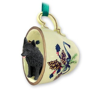 Green Holiday Schipperke Dog in Green Holiday Tea Cup Christmas Ornament – Hand-Painted Stone Resin