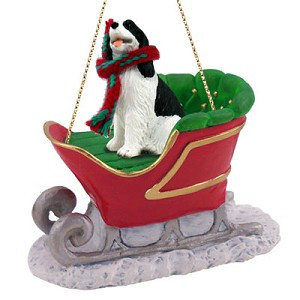 Black & White Springer Spaniel Dog in Sleigh Christmas Ornament