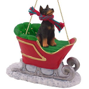 Black with Cropped Ears Doberman Pinscher Dog in Sleigh Christmas Ornament