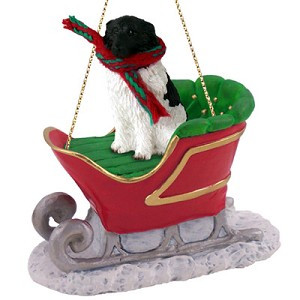 Black and White Landseer Dog in Sleigh Christmas Ornament