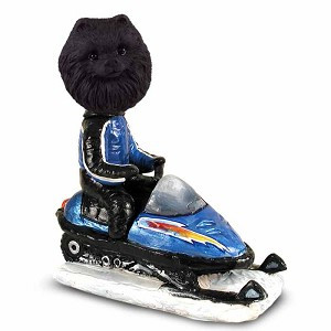 Black Pomeranian Snowmobile Doogie Collectible Dog Figurine