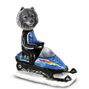 Keeshond Snowmobile Doogie Collectible Dog Figurine