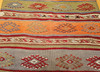 Vintage Moroccan kilim runner with geometric zigzag and star embroidery in red, pine green, terracotta, purple, and teal, mid-20th century., The Persian Knot Gallery, SKU 1512
