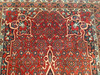 Vintage Persian Bidjar (Bijar) gallery rug with rust red Herati field, navy border, and floral medallion design, early 20th century hand woven carpet.