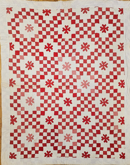 19th century Irish Chain hand-stitched pieced cotton quilt with red square pattern on an ivory background, antique American folk textile, The Persian Knot Gallery, SKU: 2346