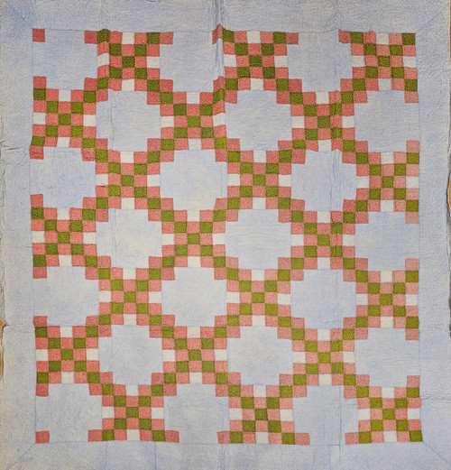 Early 20th century hand-stitched Stepped Irish Chain pieced cotton quilt with red and green squares on a blue background, The Persian Knot Gallery, SKU: 2352
