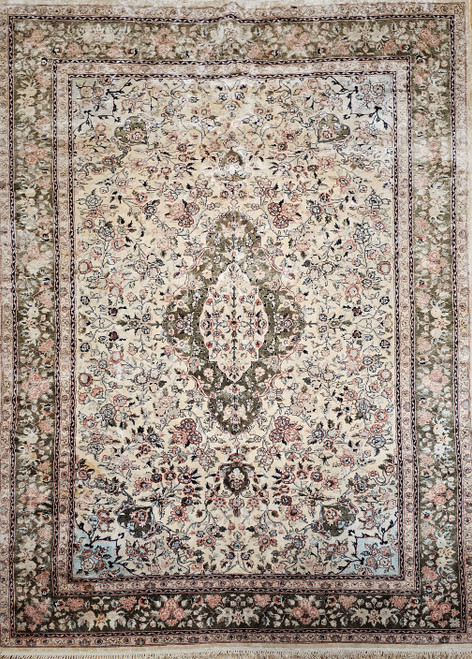 Vintage Indian hand-knotted silk rug with floral medallion design, ivory background, dark green border, pale blue spandrels, and multicolor accents, The Persian Knot Gallery, SKU: 2357