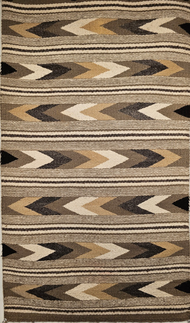 Vintage Navajo rug in a banded chevron and stripe pattern in natural earth tones including gray, ivory, black, and caramel, The Persian Knot, SKU 1567