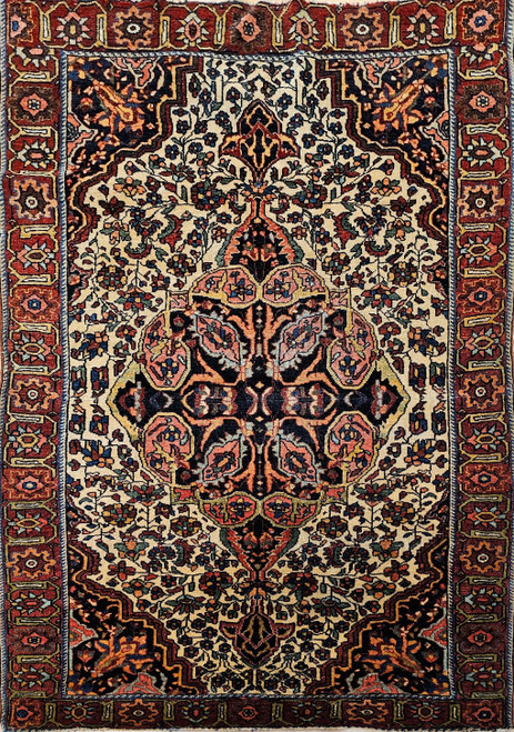 19th century Persian Farahan Sarouk area rug in saffron yellow with blue medallion and rust floral border