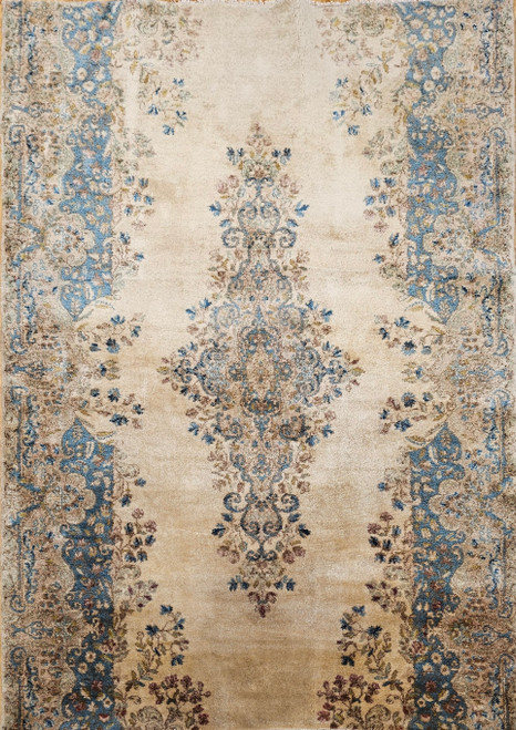 Vintage Persian Kerman rug with cream field, floral medallion, and sky-blue and pink border, hand-knotted in the 2nd quarter of the 1900s, The Persian Knot Galleruy, SKU: 1016