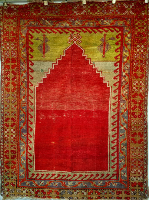Vintage Anatolian Turkish Prayer rug. Hand-knotted. Abrash red color in the center field. Shades of green and yellow in the Mihrab on top of the rug. Made with natural vegetable dyes. Authentic and collectible. Vintage Anatolian Turkish Prayer rug. Hand-knotted. Abrash red color in the center field. Shades of green and yellow in the Mihrab on top of the rug. Made with natural vegetable dyes. Authentic and collectible.