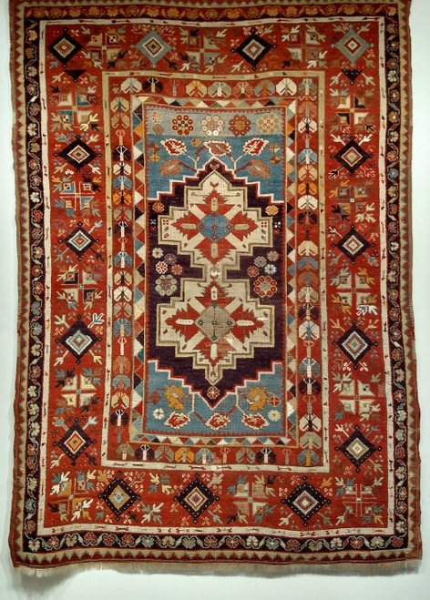Vintage Anatolian prayer rug in purple and blue with geometric brick-red border, handwoven with natural dyes, The Persian Knot Gallery, SKU: 1588