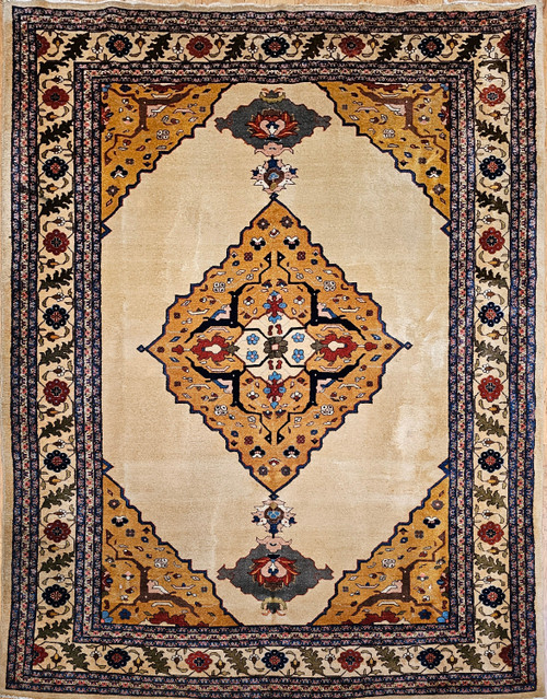 Antique Agra rug from early 1900s India with a yellow medallion, camel field, and Art Deco-inspired botanical motifs, The Persian Knot Gallery, SKU 1619 Antique Agra rug from early 1900s India with a yellow medallion, camel field, and Art Deco-inspired botanical motifs, The Persian Knot Gallery, SKU 1619