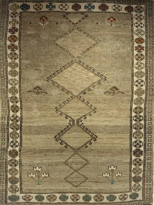 Vintage Kurdish Bidjar area rug. Hand-woven. Geometric diamond design with scattered small tree forms. Abrash natural camelhair wool. Colors: camelhair, with accents in other natural colors. A gem of tribal weaving from Western Persia.