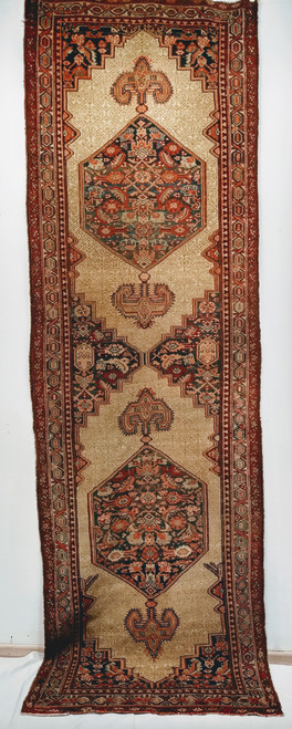 Late 19th Century Antique Persian Serab camelhair runner. Hand-knotted. Two abrash blue/green hexagonal medallions on undyed natural camelhair background. Colors: cobalt, saffron, French blue, pistachio, umber. Over 120 years old. Masterpiece weave. Late 19th Century Antique Persian Serab camelhair runner. Hand-knotted. Two abrash blue/green hexagonal medallions on undyed natural camelhair background. Colors: cobalt, saffron, French blue, pistachio, umber. Over 120 years old. Masterpiece weave.