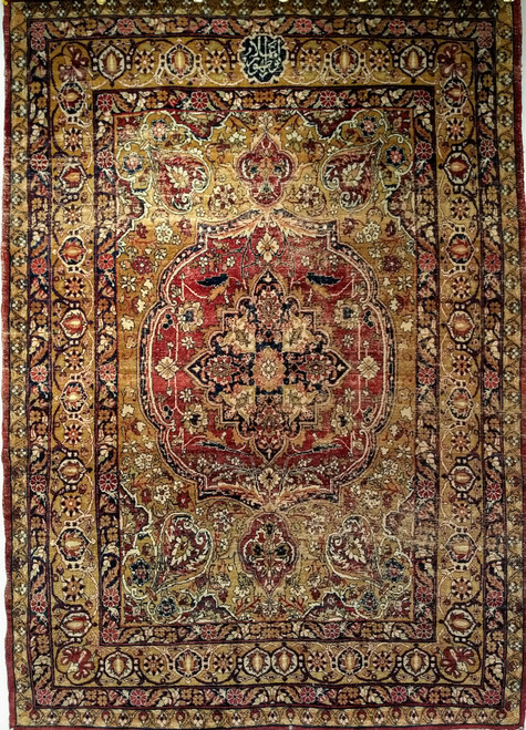 19th Century Antique Persian Kerman Lavar rug. Hand-knotted, late 1800s. Unique red central medallion. Gold color field. Silk highlighting. Colors: gold, red, and green