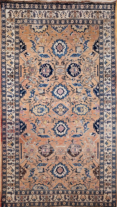 Early 20th Century Vintage Persian Malayer gallery or corridor size rug. Hand-knotted. All-over large geometric forms on tan field. Colors: navy blue, baby blue, brown, pink, yellow. Cream border with various color geometric designs. Abrash vegetable dyes