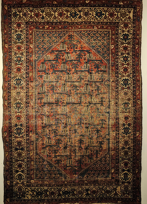 Antique Persian Malayer rug, early 1900s, with geometric design, rust field, French blue spandrels, paisley motifs, and cream border with crab forms.
