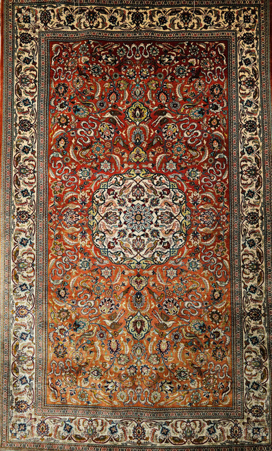 Vintage Turkish Hereke all-silk area rug. Hand-knotted. "Garden Design" with flowers and birds. Copper-red field. Cream central medallion. Ivory border with flowers and birds. Extremely high knot density. Colors: blue, green, yellow, brown, cream. Wall display quality.