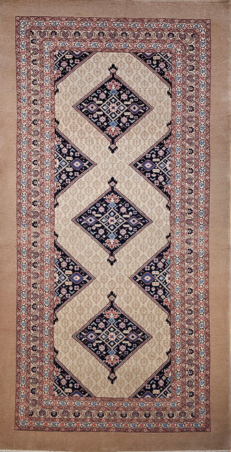 Mid-20th Century Vintage Persian Malayer gallery or corridor size rug. Handwoven. Open-field design on camel hair background. Three axial medallions in deep navy with geometric motifs in baby blue, pink, French blue. Cream field with paisley motif. Corner