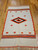 Vintage Mexican Serape Saltillo Kilim Rug in Cream and Orange Colors with Bird Design 1909, 3’ 6” x 6’ 2” , 4th Quarter of the 1900s, Mexico, The Persian Knot, SKU 1909