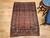 Antique Turkmen Tekke Rug 4x5 | Classic Gul Red Field | In-Room View 6
