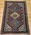 Antique Persian Qashqai Tribal Rug 4x6 | Triple Medallion | In-Room View 9