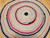 Antique American Round Braided Rug 1940s | Vibrant | Center Field Close-Up
