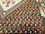 Vintage Moroccan Berber Rug 6x8 | Neutral Medallion | Border Detail
