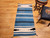 Vintage American Southwestern area rug with Persian blue striped field and ivory and black accents, handwoven wool flat weave, @thepersianknot  , SKU 2165