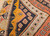 Vintage Anatolian Turkish kilim wide runner with three geometric medallions, ivory border, and natural dye colors including pale brick, tan, navy, and yellow, handwoven early 1900s, SKU 2215