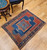 Antique Caucasian Fachralo Kazak | Rug | In-Room View 3