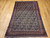 Antique Persian Afshar Tribal Rug 5x7 | Paisley Boteh | Full View on Floor