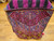 19th century Caucasian Karabagh Soumak Mafrash tribal cargo bag with four panels and kilim base in red, yellow, pink, and purple, The Persian Knot Gallery, SKU: 2334